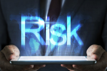 Business concept on tablet with hologram