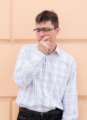 Portrait of a thoughtful and worried business man on the street