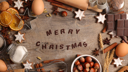 merry christmas background with spices and biscuit
