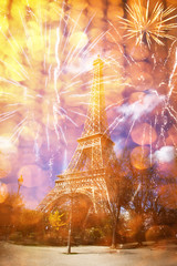 celebrating New Year in the city - Eiffel tower (Paris, France) with fireworks