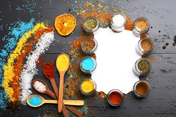 Set of spices on dark grey background. Food art concept.