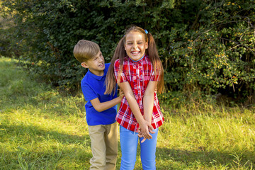 Fototapeta premium Kids playing in a park