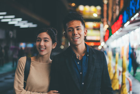 Young japanese couple spending time together in Tokyo