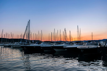 yachts in pier at sunset in Saint Tropez	