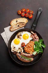 English breakfast. Fried eggs, sausages, bacon