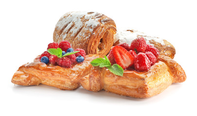 Delicious pastries on white background