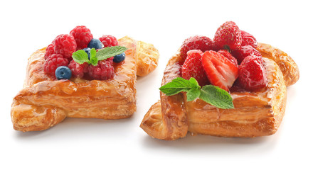 Delicious pastry on white background