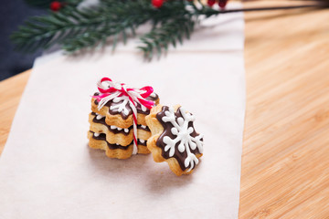 Christmas homemade gingerbread cookies on wooden table