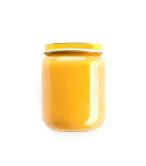 Jar with healthy baby food on white background