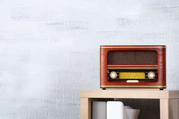 Retro radio receiver on shelf in office