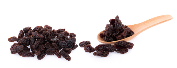 Dried raisins on a white background