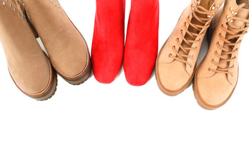 Different female shoes on white background