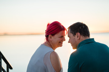 Couple watching the sunrise in Portugal