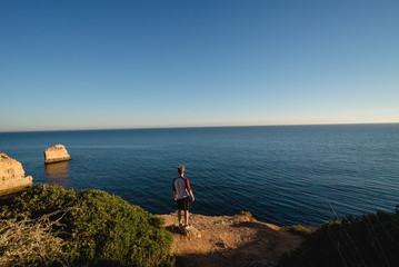 Fototapeta na wymiar Watching the sunset from a cliff in Portugal