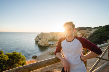 Fototapeta premium Man running on a cliff in Portugal