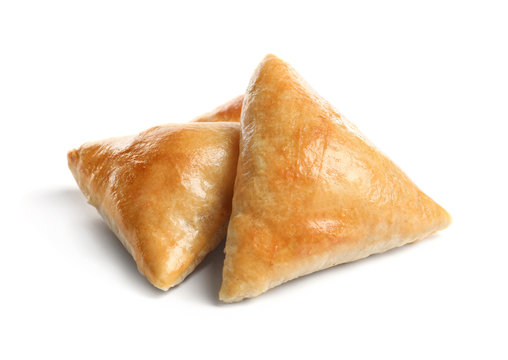 Fototapeta Delicious samosas on white background