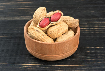 Peanuts in shell bowl