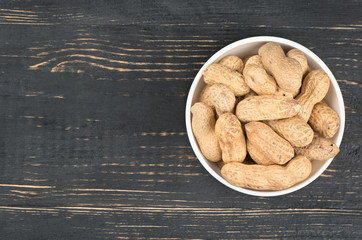 Peanuts in shell bowl
