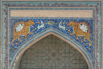 Arch with traditional ancient Asian mosaic. the details of the architecture of medieval Central Asia