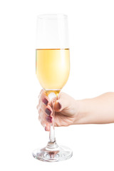 Woman hand holding a glass of expensive golden champagne