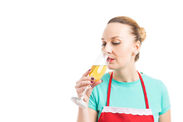 Hypermarket or supermarket employee drinking sparkling wine