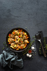 Meatballs in sauce with vegetables, top view