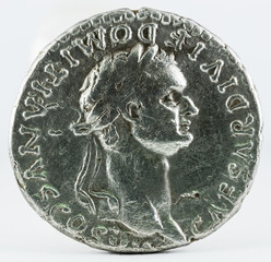 Ancient Roman silver denarius coin of Emperor Domitian. Obverse.