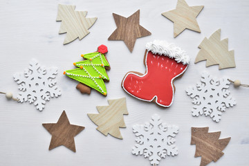Christmas Ginger cookies, wooden star, fir-tree and snowflake shapes