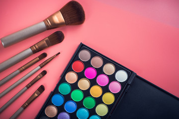 beauty colored cosmetic palette with brush