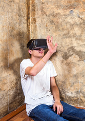 Young Man in VR Glasses