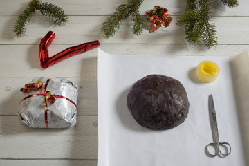 panpapato on a white wooden table and Christmas decoration
