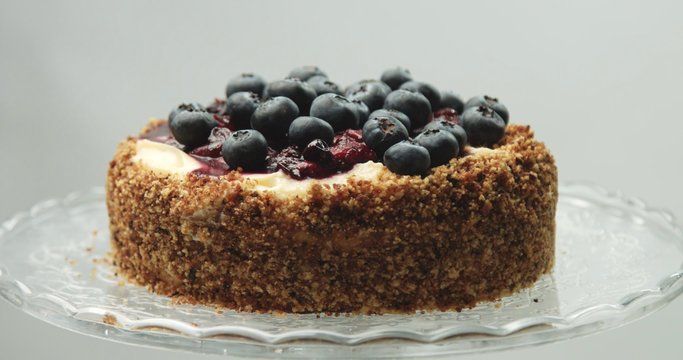 Delicious cake with custard cream and blueberries