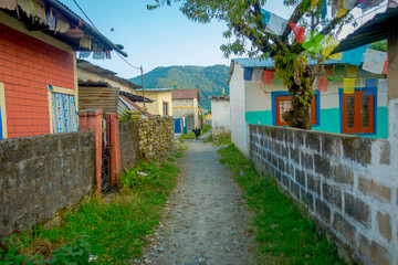 Outdoor view of a rustic street in the town, close to Tashi refugee settlement in Pokhara, Nepal