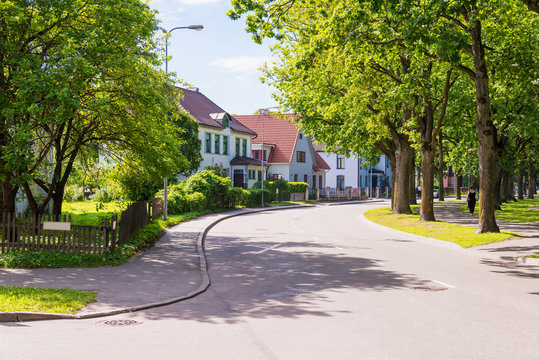 beautiful street with modern residential houses in summer sunny