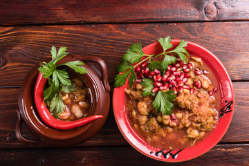 food studio with vegetarian beans spicy ragout with pepper and pomegranate