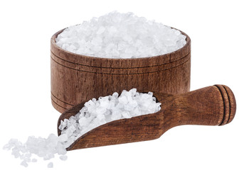 Sea salt in wooden bowl and scoop isolated on white background closeup, top view