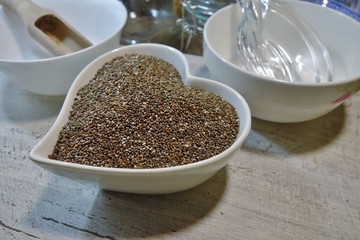 Healthy chia seeds (lat. Salvia hispanica) in small bowl.Selective Focus
