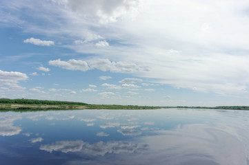 River view with clouds reflected in it, Volga, Russia