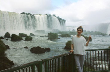 young woman near Iguazu Falls on Argentina and Brazil Borders