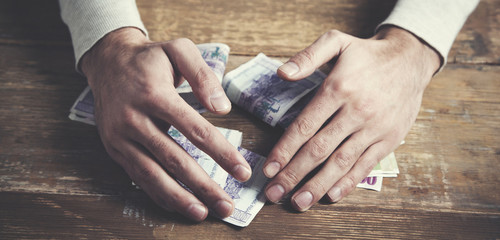 Man holdig  money in his hands