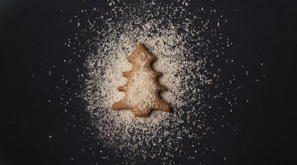 Festive gingerbread christmas tree shaped cookie