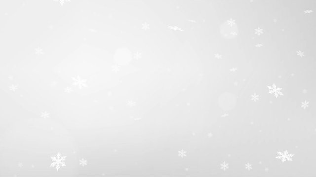 Beautiful silver loopable abstract winter snow background with falling snowflakes and floating blurry glitter particles lights. 4K seamless loop video footage of the snowfall.