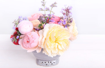 Festive flower English rose composition on the white background. Overhead view. Copy space. Birthday, Mother's, Valentines, Women's, Wedding Day concept.