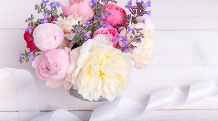 Festive flower English rose composition on the white background. Overhead view. Copy space. Birthday, Mother's, Valentines, Women's, Wedding Day concept.