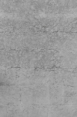 Plastered brick wall, large bricks, surface