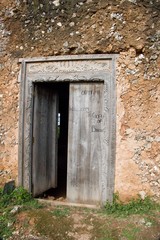 Fototapeta na wymiar typical zanzibar decorated wooden door