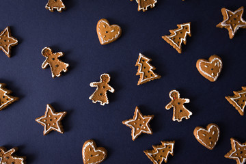 Brown gingerbreads on blue background