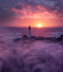 Fototapeta na wymiar California Lighthouse & Fog sunset