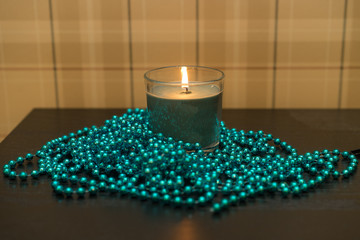 Burning candle as holiday decorations