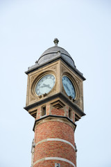 The tower with clock of the main railway station - Gent-Sint-Pieters, Ghent, Belgium